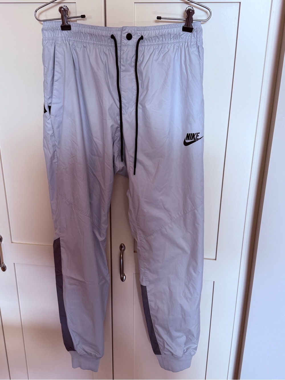 Nike Light Gray Track Pants with Black Logo and Drawstring